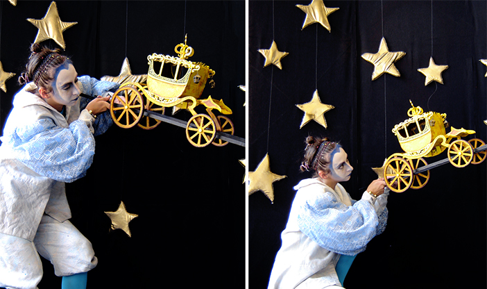 Harlequin Performer holding golden carriage prop
